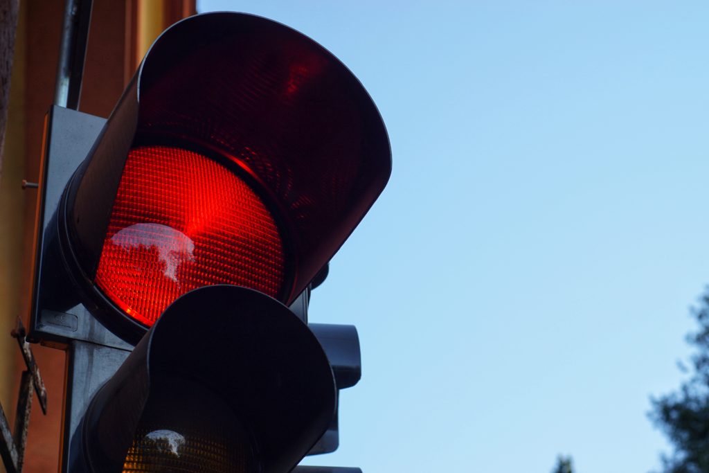 close up of red light at an intersection