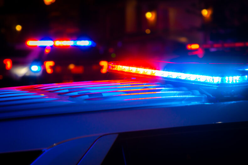 closeup of police blue and red police siren