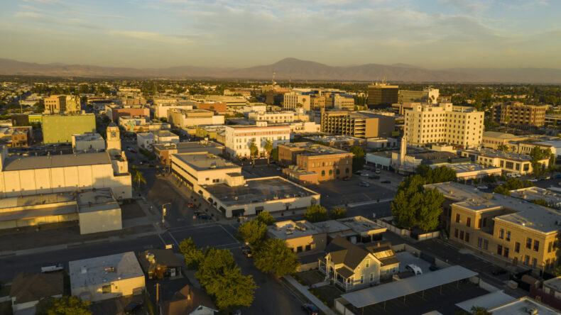 The southern city center downtown area of Bakersfield aerial view illuminated by late afternoon light