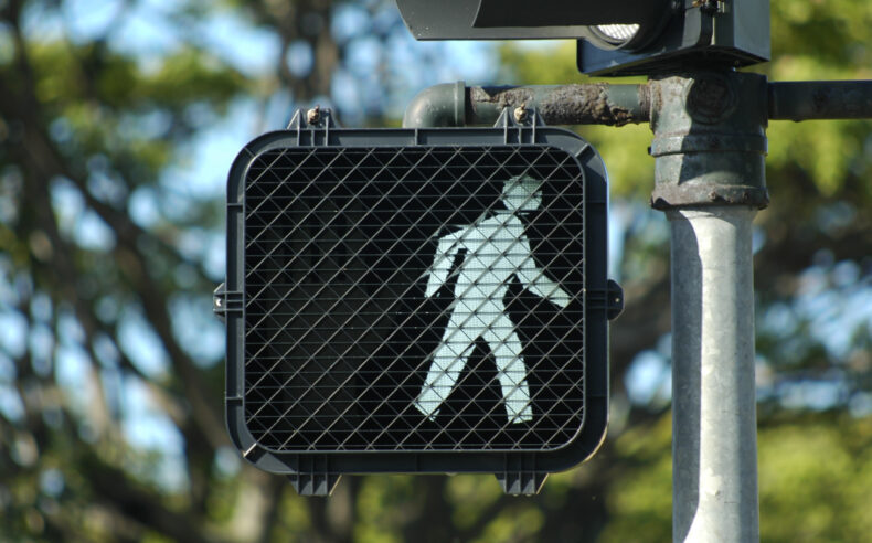 Pedestrian crossing marked crosswalk